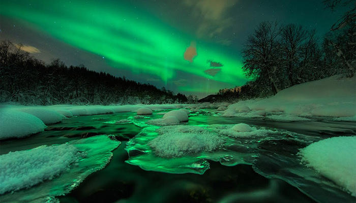 aurora-shines-over-river-norway